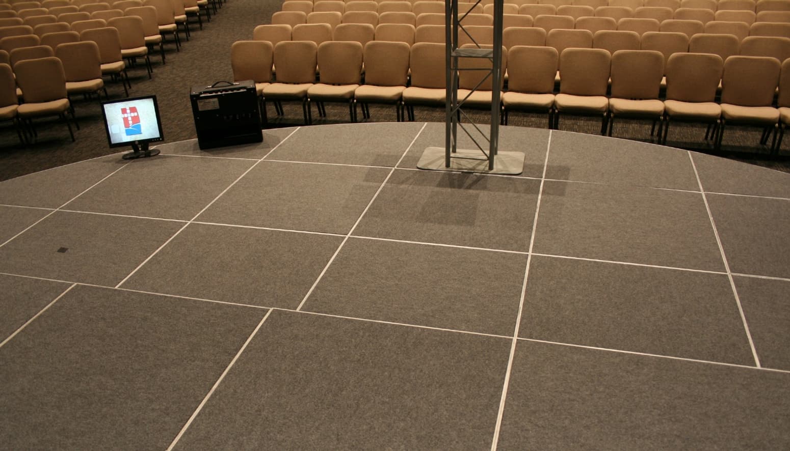 A portable floor pocket system makes our stage design cubes easy to connect.