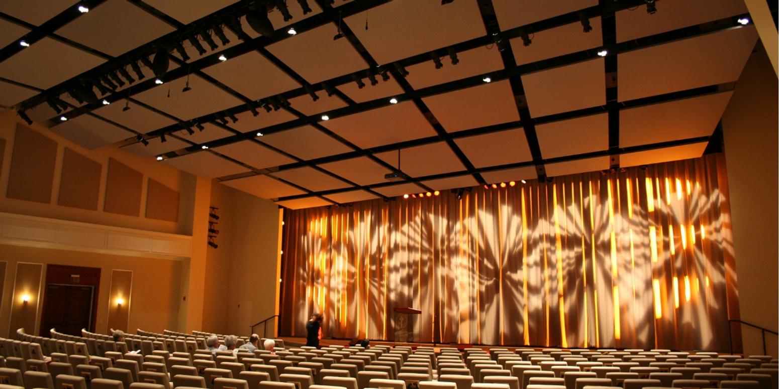 Acoustic company Paragon 360 installed these acoustic panels seen in an auditorium.