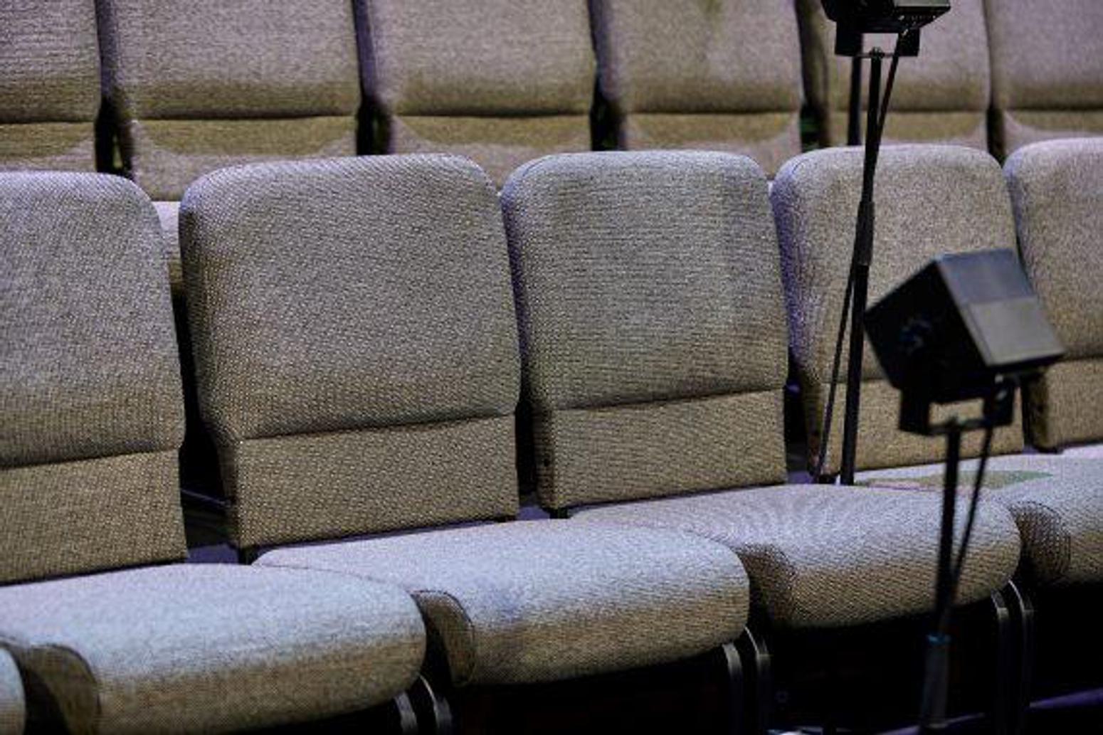 This church seating without arms increases seating capacity.